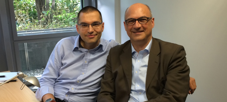 Dr. Simon Licĕn and Dr. Thomas Horky smiling in Germany